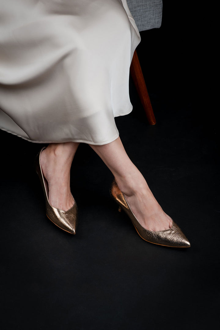 Champagne white satin skirt with gold heels styling, satin skirt and heels, warm gold heels, gold heels outfit inspiration oleah heels